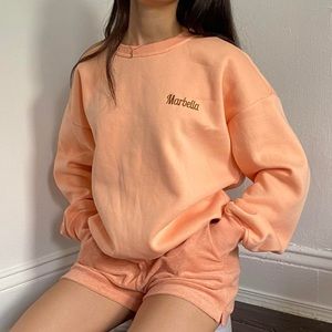 Classic relaxed crew neck made with premium fabric. Independent brand DOTT.